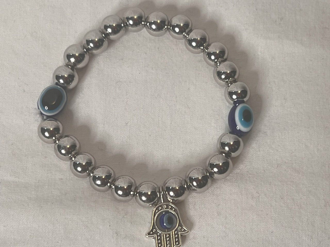 Sterling Silver Bracelet with Red Evil Eye – Courage & Protection