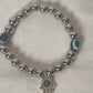 Sterling Silver Bracelet with Red Evil Eye – Courage & Protection